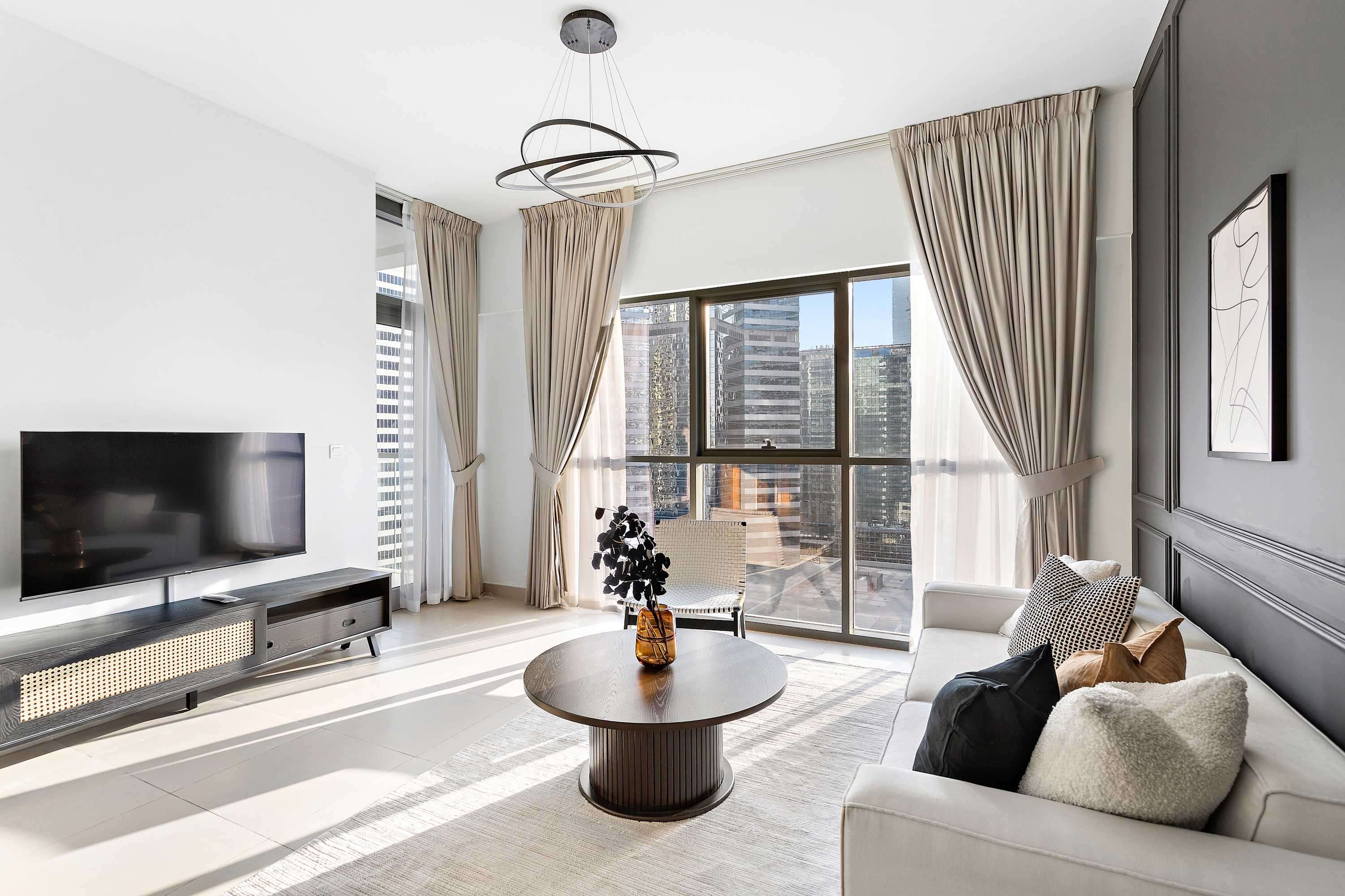 شقة أنيقة بغرفة نوم واحدة في برج بيلفيو مع إمكانية الوصول إلى المسبح